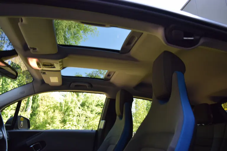 BMW i3 Executive Edition 120Ah 42 kWh | Org. NL | BOVAG Garantie | Warmtepomp | Panoramadak | Stoelverwarming | Adaptive Cruise Control | Achteruitrijcamera | Navigatie | Full LED | 20'' Velgen | afbeelding 34
