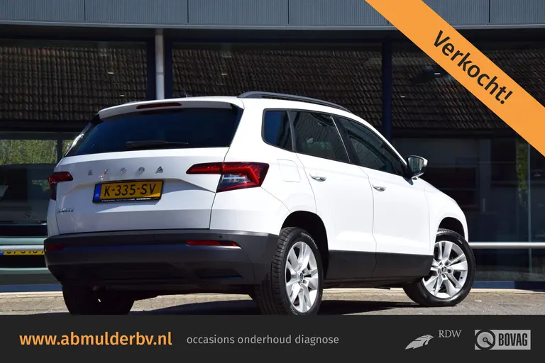 Skoda Karoq 1.5 TSI 150PK ACT Business Edition DSG Automaat | Org. NL | BOVAG Garantie | Trekhaak | Volledig Lederen Bekleding | Apple Carplay/Android Auto | PDC Voor&Achter | Cruise&Climate Control | afbeelding 1