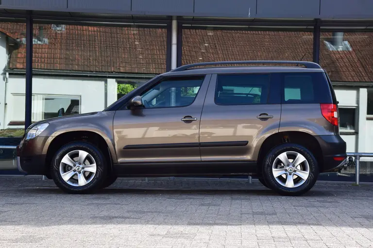 Skoda Yeti 1.2 TSI Ambition | Org. NL | Trekhaak | 16'' Velgen | All Season Banden | Cruise & Climate Control | Multifunctioneel Stuurwiel | Goed Onderhouden | afbeelding 4