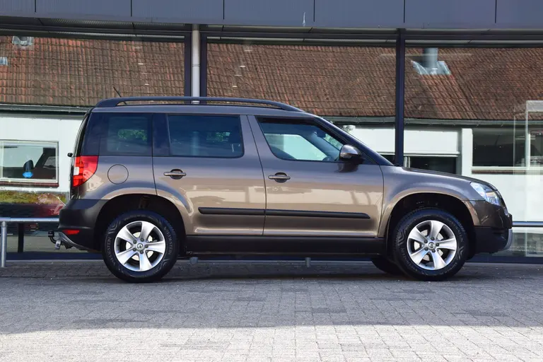 Skoda Yeti 1.2 TSI Ambition | Org. NL | Trekhaak | 16'' Velgen | All Season Banden | Cruise & Climate Control | Multifunctioneel Stuurwiel | Goed Onderhouden | afbeelding 5