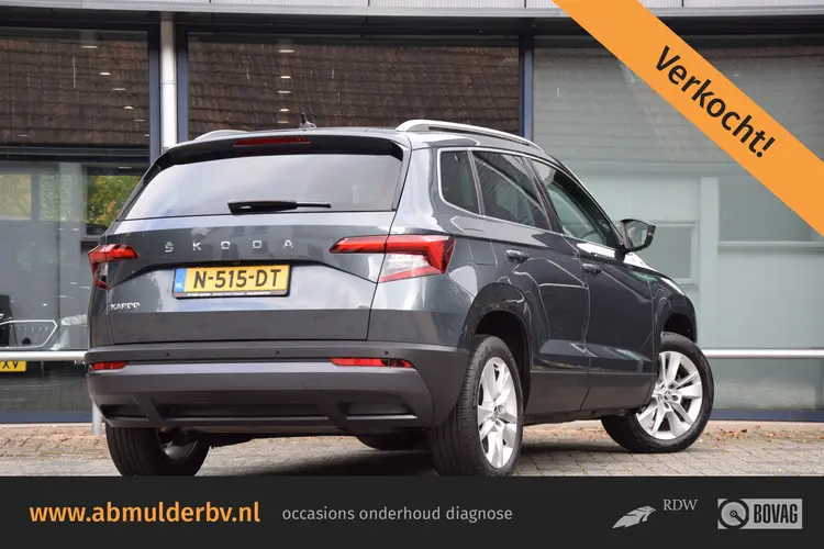 Skoda Karoq 1.5 TSI ACT 150PK Business Edition Plus DSG Automaat | Org. NL | BOVAG Garantie | Trekhaak | Adaptive Cruise Control | Stoel & Voorruit Verwarming | Camera | Apple Carplay/Android Auto |