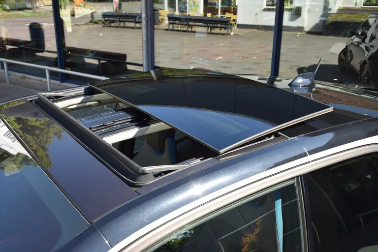 BMW i3 Executive Edition 120Ah 42 kWh | Org. NL | BOVAG Garantie | Warmtepomp | Panoramadak | Stoelverwarming | Adaptive Cruise Control | Achteruitrijcamera | Navigatie | Full LED | 20'' Velgen | afbeelding 15