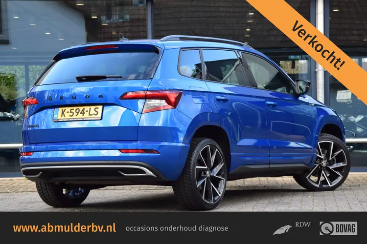 Skoda Karoq 1.5 TSI ACT Sportline Business | Incl. BOVAG Garantie | Geen import | Trekhaak | Apple Carplay/Android Auto | PDC Voor+Achter | Stoel&Stuurverwarming | 19'' Velgen | Full LED |