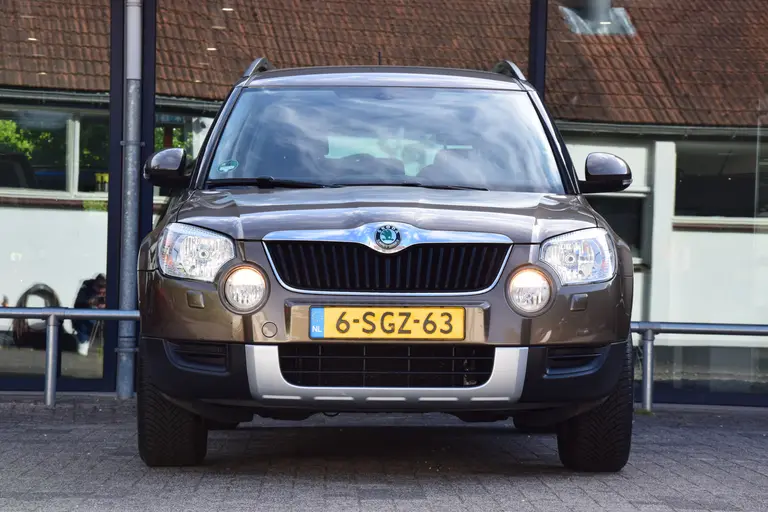 Skoda Yeti 1.2 TSI Ambition | Org. NL | Trekhaak | 16'' Velgen | All Season Banden | Cruise & Climate Control | Multifunctioneel Stuurwiel | Goed Onderhouden | afbeelding 11