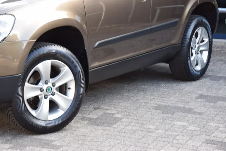 Skoda Yeti 1.2 TSI Ambition | Org. NL | Trekhaak | 16'' Velgen | All Season Banden | Cruise & Climate Control | Multifunctioneel Stuurwiel | Goed Onderhouden | afbeelding 16
