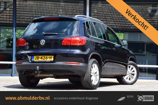 Volkswagen Tiguan 1.4 TSI Sport&Style 160PK | Trekhaak | Navigatie | Volledig Lederen Interieur | Parkeersensoren Achter | Xenon Verlichting | Stoelverwarming | Bluetooth Telefoonverbinding |