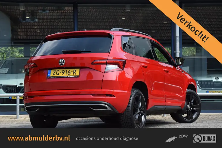 Skoda Karoq 1.5 TSI ACT Sportline Business DSG Automaat | incl. BOVAG Garantie | NL-Auto | Trekhaak | Navigatie | Virtual Cockpit | Achteruitrijcamera | 18'' Velgen | Full LED | Carplay | DAB | Keyless Entry&GO | afbeelding 1