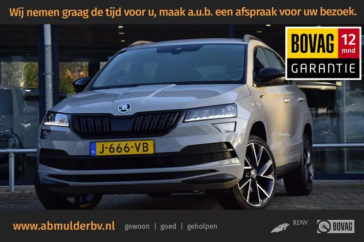 Skoda Karoq 1.5 TSI 150PK ACT Sportline Business DSG Automaat | Org. NL | BOVAG Garantie | Trekhaak | 19'' Velgen | Virtual Cockpit | Achteruitrijcamera | Stoel/Stuur&Voorruitverwarming |