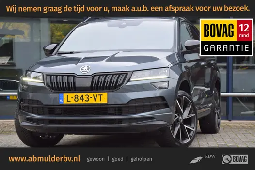 Skoda Karoq 1.5 TSI 150PK ACT Sportline Business DSG Automaat | Org. NL | BOVAG Garantie | Trekhaak | Panoramadak | Camera | 19'' Velgen | Canton | Stoel/Stuur/Voorruitverwarming | Adaptive Cruise Control |